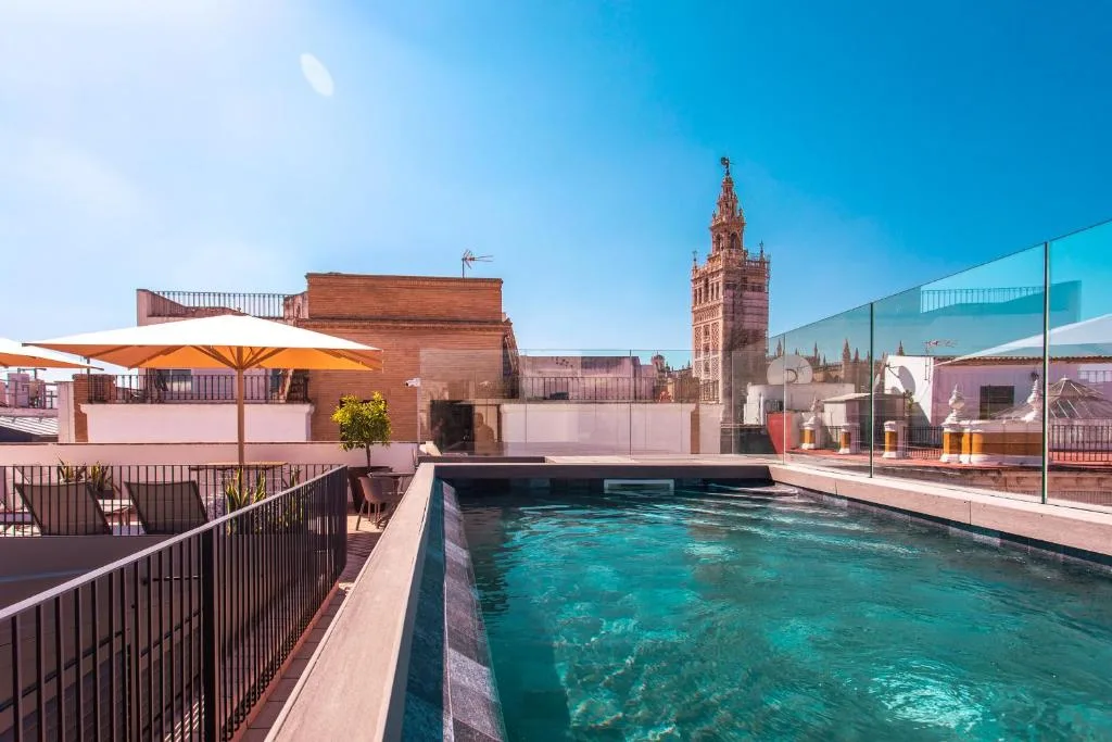 Casa Alhaja by Shiadu Seville rooftop pool with Giralda view